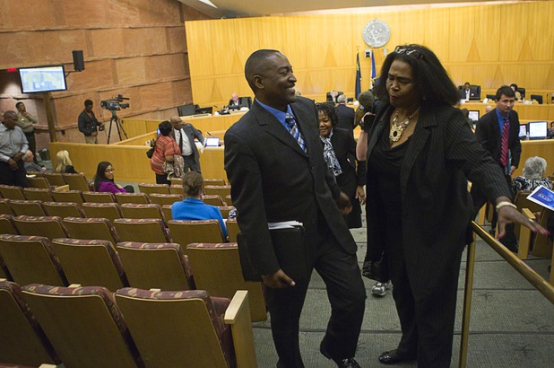 Tyrone Thompson talks with community activist Marzette Lewis after he was appointed to replace expelled Nevada Assemblyman Steven Brooks during a county commission meeting at the Clark County Government Center Tuesday, April 16, 2013.