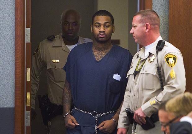 Ammar Harris, the suspect the Feb. 21 Las Vegas Strip shooting and car crash that killed three people, is escorted into the courtroom at the Regional Justice Center Wednesday, April  17, 2013.