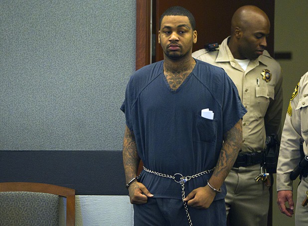Ammar Harris, the suspect the Feb. 21 Las Vegas Strip shooting and car crash that killed three people, is escorted into the courtroom at the Regional Justice Center Wednesday, April  17, 2013.