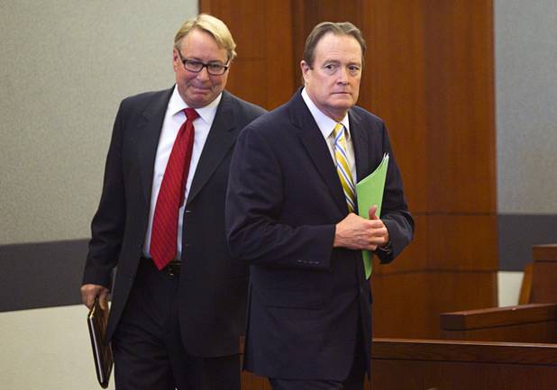 Defense attorneys Randall Pike, left and David Schieck, representing Ammar Harris, the suspect the Feb. 21 Las Vegas Strip shooting and car crash that killed three people, arrive in court at the Regional Justice Center Wednesday, April  17, 2013.