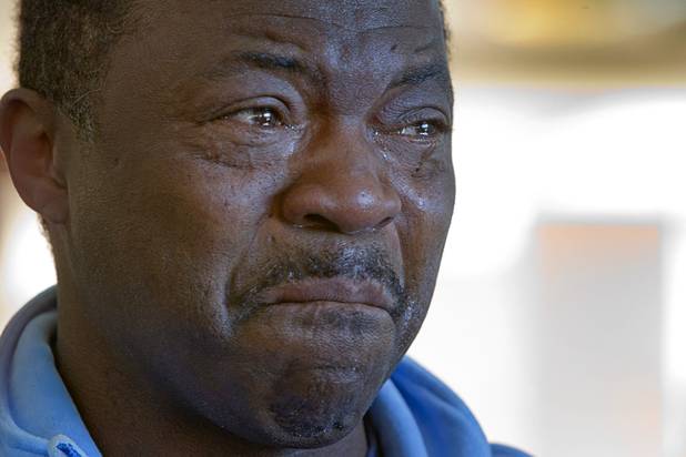 Tehran Boldon, brother of taxi driver Michael Boldon, struggles to maintain his composure as speaks to reporters following a hearing for Ammar Harris, the suspect the Feb. 21 Las Vegas Strip shooting and car crash that killed three people, at the Regional Justice Center Wednesday, April  17, 2013. Michael Boldon was one of the people killed in the crash.