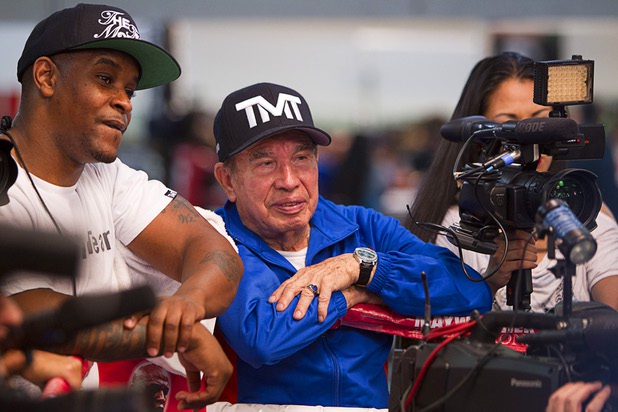 DeJuan Blake (L) and cutman Rafael Garcia watch as Floyd Mayweather Jr. works out at the Mayweather Boxing Club Wednesday, April 17, 2013. Mayweather will defend his WBC welterweight title against Robert Guerrero at the MGM Grand Garden Arena on May 4.
