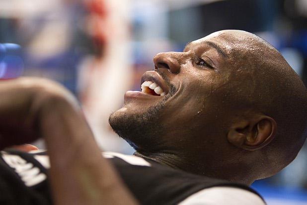 Undefeated welterweight boxer Floyd Mayweather Jr. smiles during a workout at the Mayweather Boxing Club Wednesday, April 17, 2013. Mayweather will defend his WBC welterweight title against Robert Guerrero at the MGM Grand Garden Arena on May 4.
