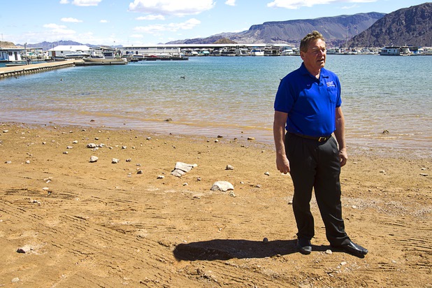 Bob Gripentog, president of Las Vegas Boat harbor, stands by the shore of Lake Mead during a news conference at the lake Wednesday, April 17, 2013. American Rivers, Nuestro Rio, Protect the Flows, and the National Young Farmers Coalition held the news conference to announce the Colorado River as America's #1 Most Endangered  River of 2013.