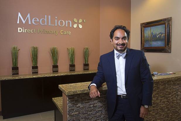 Dr. Samir Qamar poses at the MedLion office, 851 S. Rampart Blvd., Thursday, April 18, 2013. MedLion is a physician group membership plan. For $59 per month, patients get access to a primary care physician. There is no insurance involved.