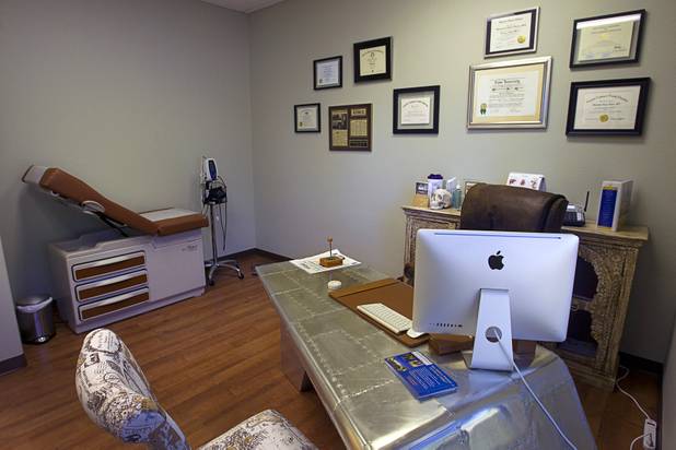 Dr. Samir Qamar's office and exam room is shown at the MedLion office, 851 S. Rampart Blvd., Thursday, April 18, 2013. MedLion is a physician group membership plan. For $59 per month, patients get access to a primary care physician. There is no insurance involved.