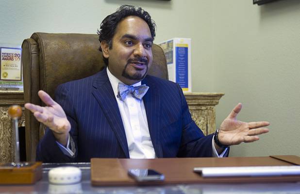 Dr. Samir Qamar responds to a question during an interview at the MedLion office, 851 S. Rampart Blvd., Thursday, April 18, 2013. MedLion is a physician group membership plan. For $59 per month, patients get access to a primary care physician. There is no insurance involved.