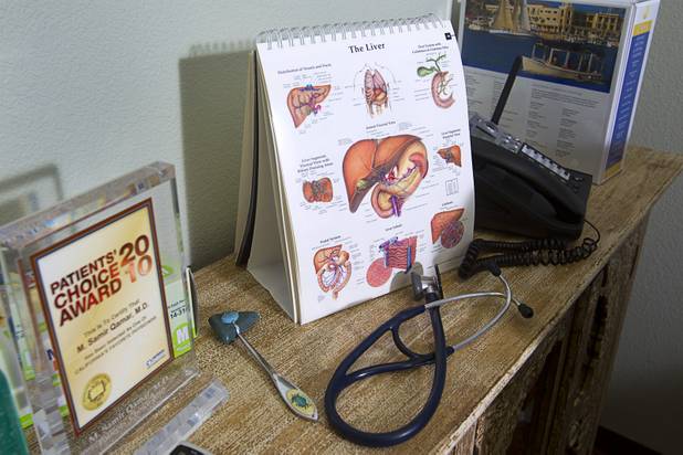 A reflex hammer and stethoscope are shown on a shelf at the MedLion office, 851 S. Rampart Blvd., Thursday, April 18, 2013. MedLion is a physician group membership plan. For $59 per month, patients get access to a primary care physician. There is no insurance involved.