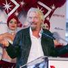 Sir Richard Branson, Virgin Group founder, speaks during a news conference to celebrate the new Virgin America service between Los Angeles and Las Vegas after the arrival of the inaugural flight at McCarran International Airport Monday, April 22, 2013.