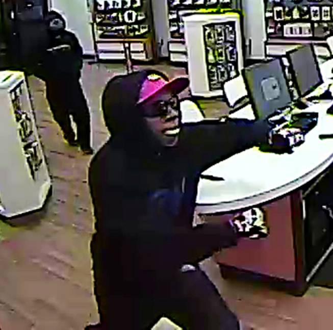 Police are seeking two men in the robbery of a store March 5 near Nellis Boulevard and Stewart Avenue.