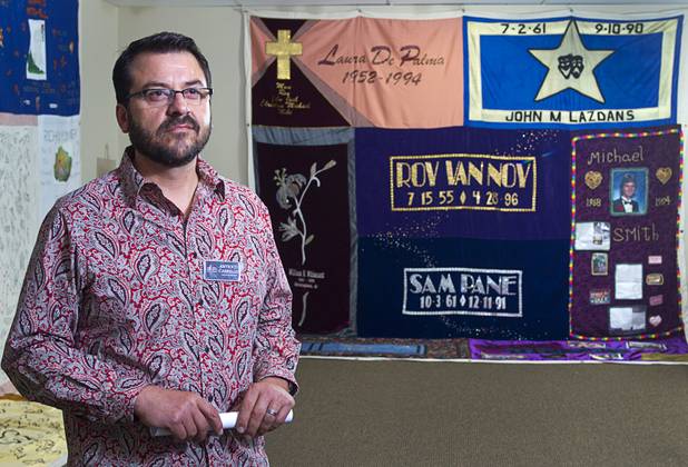 Antioco Carrillo, Afan executive director, stands among quilts at the AFAN offices Wednesday, April 24, 2013. The quilts, part of the Names Project and the AIDS Memorial Quilt, feature the names of Nevada residents who have died from HIV/AIDS and will be on display until April 30. The display is open to the public Monday through Friday, 9 a.m. to noon and 1 p.m. to 5 p.m.