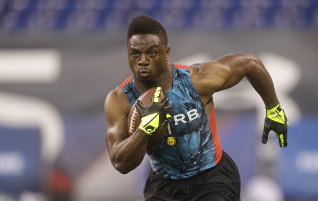 Utah State running back Kerwynn Williams, a Valley grad, runs a drill during the NFL football scouting combine in Indianapolis on Feb. 24, 2013.