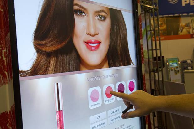 A vending machine featuring the he Kardashian line of Khroma Beauty products is displayed during the NAMA (National Automatic Merchandising Association) One Show at the Sands Expo Center Wednesday, April 25, 2013. The NAMA One Show convention serves the vending, coffee and food service industries.