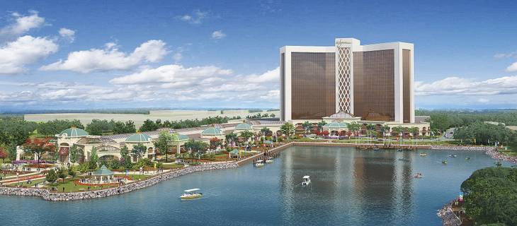 This artist's rendering released Wednesday, March 27, 2013, by Wynn Resorts shows a proposed resort casino on the banks of the Mystic River in Everett, Mass.