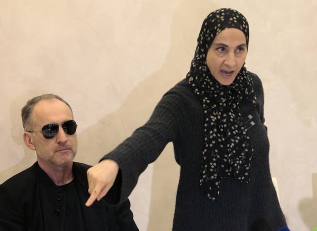 The mother of the two Boston bombing suspects, Zubeidat Tsarnaeva, with the suspects' father, Anzor Tsarnaev, left, speaks at a news conference in Makhachkala in the southern Russian province of Dagestan on Thursday, April 25, 2013.