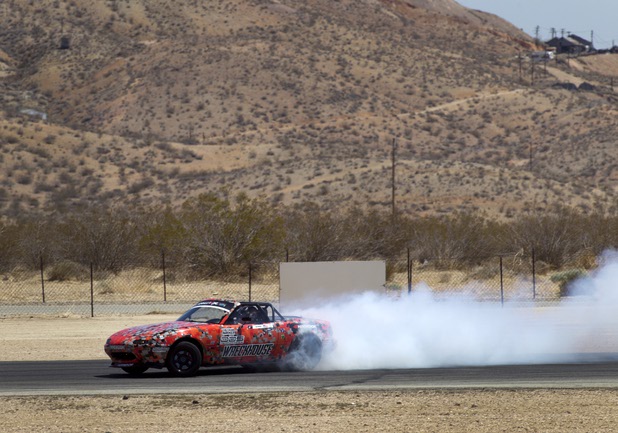 Formula Drift driver Danny George of Las Vegas practices with the 1990 WreckHouse Mazda Miata at the Willow Springs International Raceway near Rosamund, Calif. Sunday, April 28, 2013. George will compete in round two of the 2013 season at Atlanta on May 10-11.