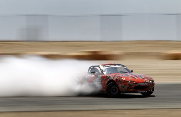 Formula Drift driver Danny George of Las Vegas slides the 1990 WreckHouse Mazda Miata during testing at the Willow Springs International Raceway near Rosamund, Calif. Sunday, April 28, 2013. George will compete in round two of the 2013 season at Atlanta on May 10-11.