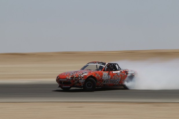 Formula Drift driver Danny George of Las Vegas slides the 1990 WreckHouse Mazda Miata during testing at the Willow Springs International Raceway near Rosamund, Calif. Sunday, April 28, 2013. George will compete in round two of the 2013 season at Atlanta on May 10-11.