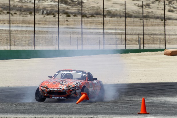 Formula Drift driver Danny George of Las Vegas slides the 1990 WreckHouse Mazda Miata during testing at the Willow Springs International Raceway near Rosamund, Calif. Sunday, April 28, 2013. George will compete in round two of the 2013 season at Atlanta on May 10-11.