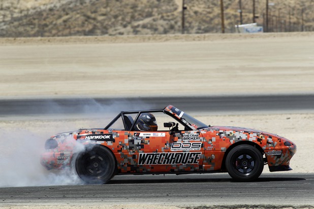 Formula Drift driver Danny George of Las Vegas and his team practice with the 1990 WreckHouse Mazda Miata at the Willow Springs International Raceway near Rosamund, Calif. Sunday, April 28, 2013. George will compete in round two of the 2013 season at Atlanta on May 10-11.