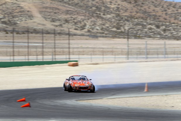 Formula Drift driver Danny George of Las Vegas slides the 1990 WreckHouse Mazda Miata during testing at the Willow Springs International Raceway near Rosamund, Calif. Sunday, April 28, 2013. George will compete in round two of the 2013 season at Atlanta on May 10-11.