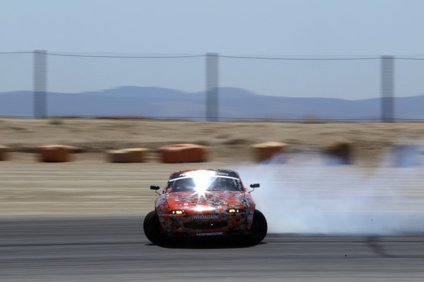Formula Drift driver Danny George of Las Vegas slides the 1990 WreckHouse Mazda Miata during testing at the Willow Springs International Raceway near Rosamund, Calif. Sunday, April 28, 2013. George will compete in round two of the 2013 season at Atlanta on May 10-11.
