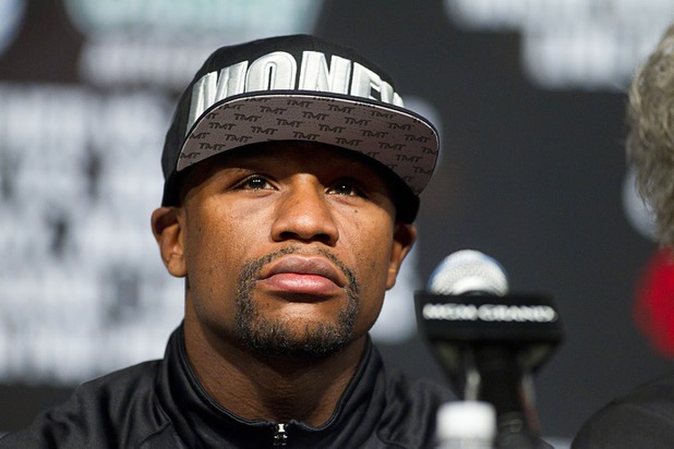 Undefeated WBC welterweight champion Floyd Mayweather Jr. attends a news conference at the MGM Grand Wednesday, May 1, 2013. Mayweather will defend his title against Robert Guerrero at the MGM Grand Garden Arena on Saturday.