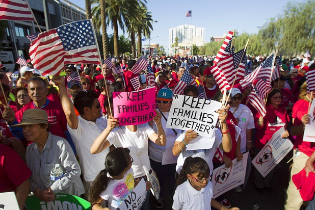 People wait for the start of a May Day rally and march for comprehensive immigration reform at the George Federal Building Wednesday, May 1, 2013. The event started at the courthouse, then marchers traveled south on Las Vegas Boulevard, finishing with a rally at St. Louis Square near the Stratosphere.