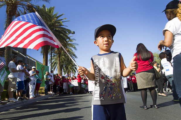 Randy Aldrete, 4, poses before a May Day rally and march for comprehensive immigration reform at the George Federal Building Wednesday, May 1, 2013. The event started at the courthouse, then marchers traveled south on Las Vegas Boulevard, finishing with a rally at St. Louis Square near the Stratosphere.