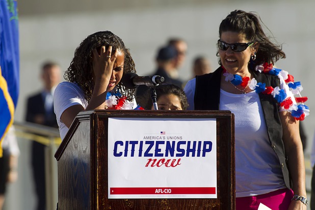 Talia Gonzalez (L),15, struggles to keep her composure as she speaks about being separated from her father during a May Day rally and march for comprehensive immigration reform in downtown Las Vegas Wednesday, May 1, 2013. With Talia is her sister Nayeli, 8, and her mother Aurora Aguilar. The event started at the George Federal Building downtown, then marchers traveled south on Las Vegas Boulevard, finishing with a rally at St. Louis Square near the Stratosphere.