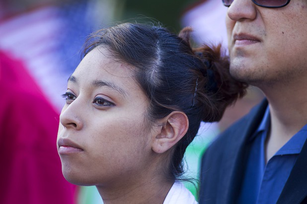 A woman listens to Geoconda Arguello Kline, secretary-treasurer of the Culinary Union Local 226, during a May Day rally and march for comprehensive immigration reform  in downtown Las Vegas Wednesday, May 1, 2013. The event started at the George Federal Building downtown, then marchers traveled south on Las Vegas Boulevard, finishing with a rally at St. Louis Square near the Stratosphere.