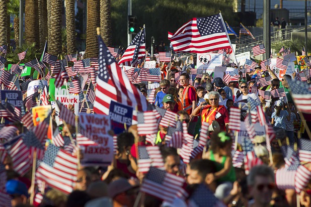 A sea of marchers head southbound on Las Vegas Boulevard during a May Day rally and march for comprehensive immigration reform in downtown Las Vegas Wednesday, May 1, 2013. The event started at the George Federal Building downtown, then marchers traveled south to a rally at St. Louis Square near the Stratosphere.
