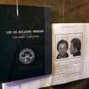 A Black Book, a State Gaming Control Board list of people excluded from Nevada casinos, is displayed at the Mob Museum in downtown Las Vegas Monday, Feb. 13, 2012. At right is a page on former mobster Tony "The Ant" Spilotro, who was removed from the book only after his death.