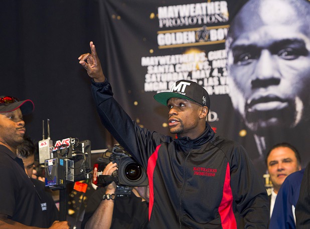 Undefeated WBC welterweight champion Floyd Mayweather Jr. arrives for an official weigh-in at the MGM Grand Garden Arena Friday, May 3, 2013. Mayweather will defend his title against Robert Guerrero at the arena on Saturday.