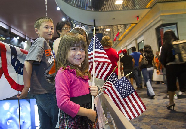 Emalina Arreola, 5, waits with family members to welcome back World War II veterans after the first Las Vegas Honor Flight at McCarran International Airport Sunday, May 5, 2013. About 35 Southern Nevada veterans visited Baltimore and memorials in Washington D.C.