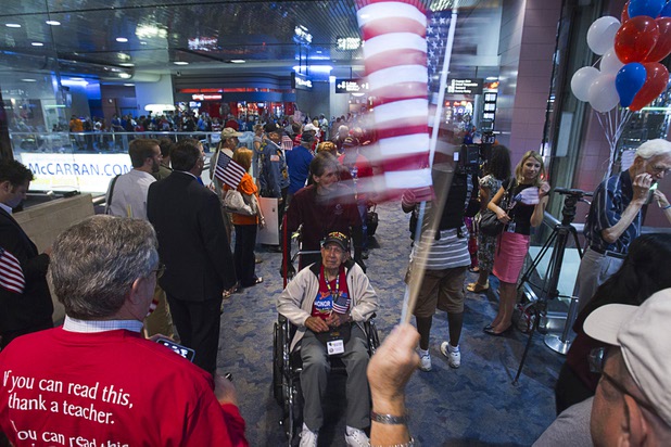World War II veterans are welcomed back after the first Las Vegas Honor Flight at McCarran International Airport Sunday, May 5, 2013. About 35 Southern Nevada veterans visited Baltimore and memorials in Washington D.C.