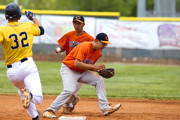 Chaparral Cowboys  second baseman Jerry Zendejas, center, prepares to force out DJ Koopman as shortstop Tommy Crone moves out of the way during a playoff game against the Boulder City Eagles in Boulder City Tuesday, May 7, 2013.