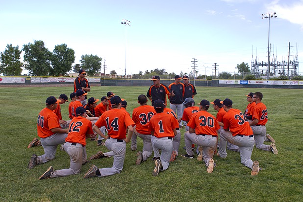 Chaparral Cowboys head coach Dave Soto talks to players after a playoff game against the Boulder City Eagles in Boulder City Tuesday, May 7, 2013.