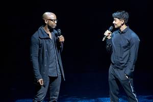 Welby Altidor, left, director of creation, and Jamie King, writer and director, discuss "Michael Jackson One" by Cirque du Soleil before a sneak peek of the show at Mandalay Bay on Tuesday, May 7, 2013.