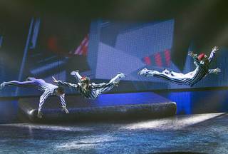 Dancers and acrobats perform during a sneak preview of the 