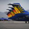 A Southwest jetliner taxis by parked Allegiant Air jetliners at McCarran International Airport, May 9, 2013.
