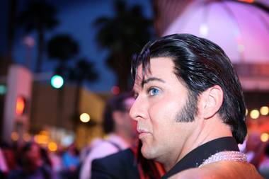 Chad Collins of Las Vegas waits to walk down the red carpet before the Las Vegas Ultimate Elvis Tribute Artist Contest on Friday, May 10, 2013, at Fremont Street Experience in downtown Las Vegas. Collins won the contest.