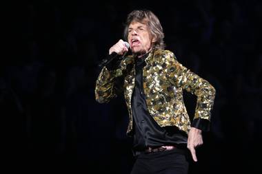 Mick Jagger sings as The Rolling Stones perform during their show at MGM Grand Garden Arena on Saturday, May 11, 2013.