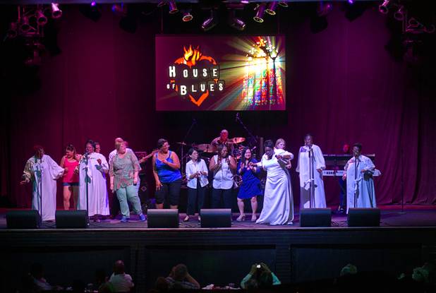 Members of the audience celebrating birthdays or marriage anniversaries dance on stage with host Patti Pennington and the Nu Vision Ensemble during a Mother's Day “Kirk Franklin’s Gospel Brunch” at the House of Blues in Mandalay Bay Sunday, May 12, 2013.