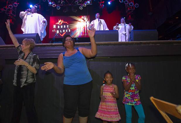 From left: Carol Vier, Felicia Norris, and cousins Kailynn Jackson, 3, and Jayla McCree, 7, dance during a Mother's Day “Kirk Franklin’s Gospel Brunch” at the House of Blues in Mandalay Bay Sunday, May 12, 2013.