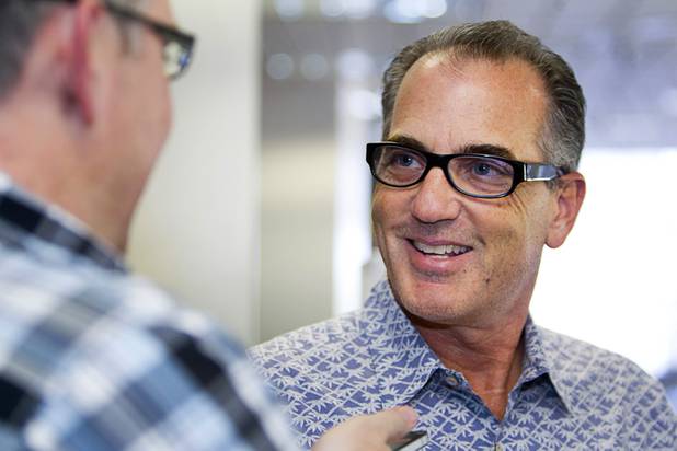 Investor Steve Mack speaks with Las Vegas Sun reporter Ray Brewer during a news conference at Cashman Field after a deal was finalized to buy the Las Vegas 51s on Monday, May 13, 2013. Summerlin Las Vegas Baseball Club LLC, a joint venture of the Howard Hughes Corp. and Play Ball Owners Group — including investors Mack, Bart Wear and Chris Kaempfer — purchased the 51s and plans to move the franchise to a new stadium in Summerlin.