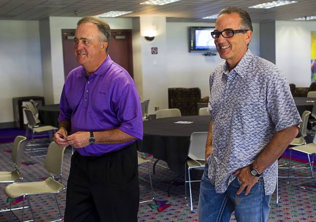 Don Logan, left, executive vice president of the Las Vegas 51s, and investor Steve Mack leave a news conference at Cashman Field after a deal was finalized to buy the Las Vegas 51s on Monday, May 13, 2013. Summerlin Las Vegas Baseball Club LLC, a joint venture of the Howard Hughes Corp. and Play Ball Owners Group — including investors Mack, Bart Wear and Chris Kaempfer — purchased the 51s and plans to move the franchise to a new stadium in Summerlin.