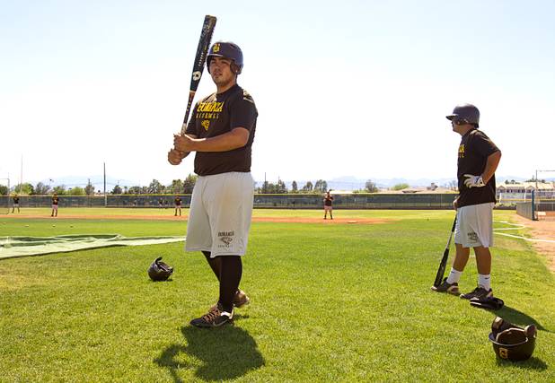 Jack Orozco, left, prepares to bat during practice at Bonanza High School Monday, May 13, 2013. Bonanza is the surprise team in the state tournament, upsetting the seven-time state champion Bishop Gorman High School twice in last week's double elimination Sunset Regional event.