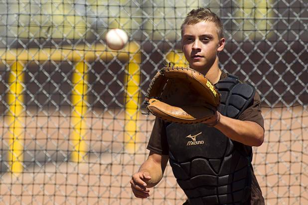 Chace Clark warms up during practice at Bonanza High School Monday, May 13, 2013. Bonanza is the surprise team in the state tournament, upsetting the seven-time state champion Bishop Gorman High School twice in last week's double elimination Sunset Regional event.
