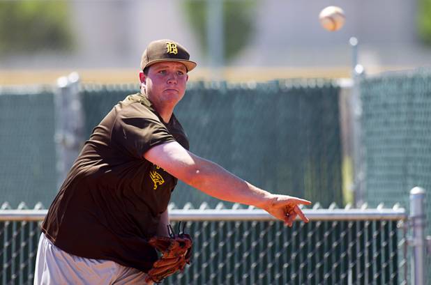 Travis Ming throws during practice at Bonanza High School Monday, May 13, 2013. Bonanza is the surprise team in the state tournament, upsetting the seven-time state champion Bishop Gorman High School twice in last week's double elimination Sunset Regional event.